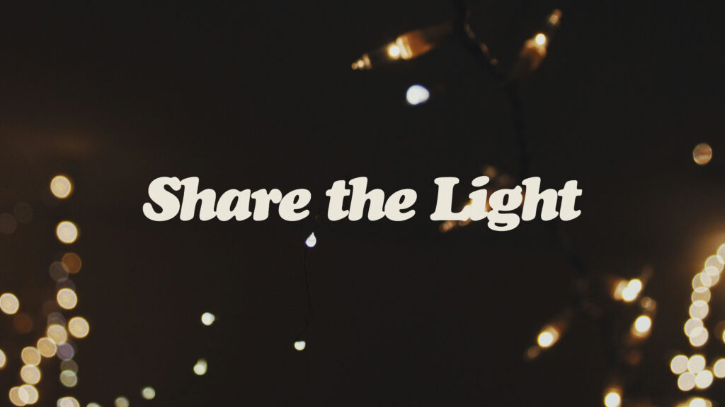 White decorative text Share the Light appears over a dark background with blurred, glowing string lights, creating a warm and inviting atmosphere.
