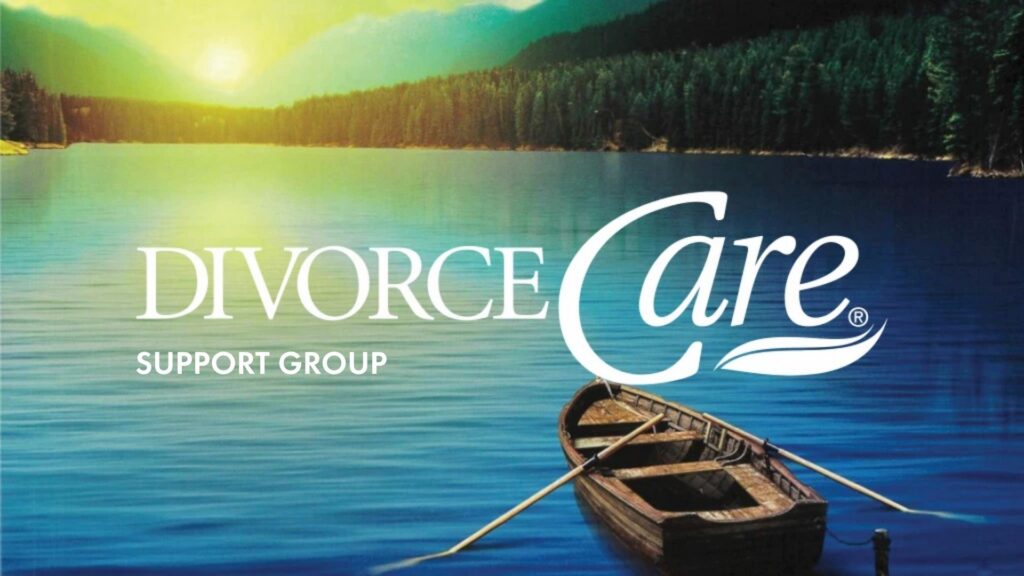A wooden rowboat floats on a calm lake at sunset, surrounded by trees and mountains. The text reads, Divorce Care Support Group.
